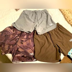 Three pairs of NFQ shorts. Men’s size Large.